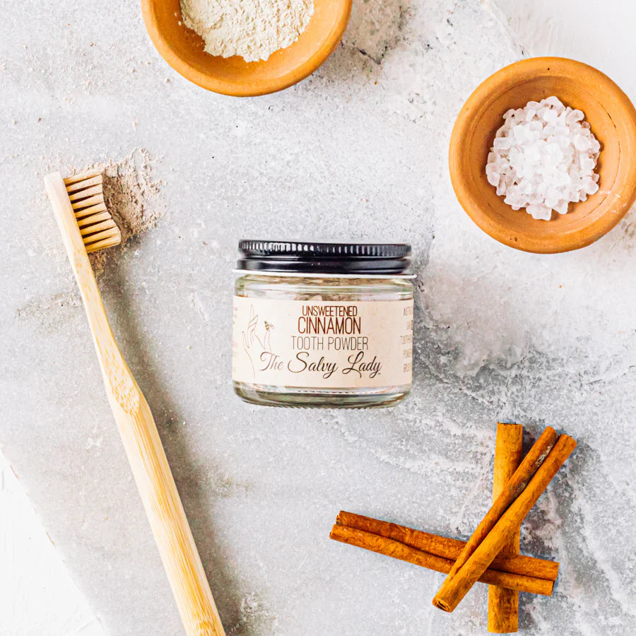 Unsweetened 2 oz Tooth Powder by The Salvy Lady in multiple flavors, fluoride-free, for natural oral care.