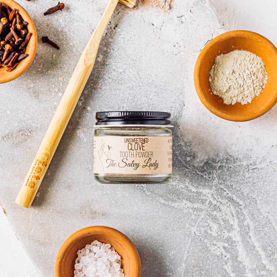 Unsweetened clove tooth powder by The Salvy Lady in a 2 oz jar, fluoride-free, designed for natural oral care.