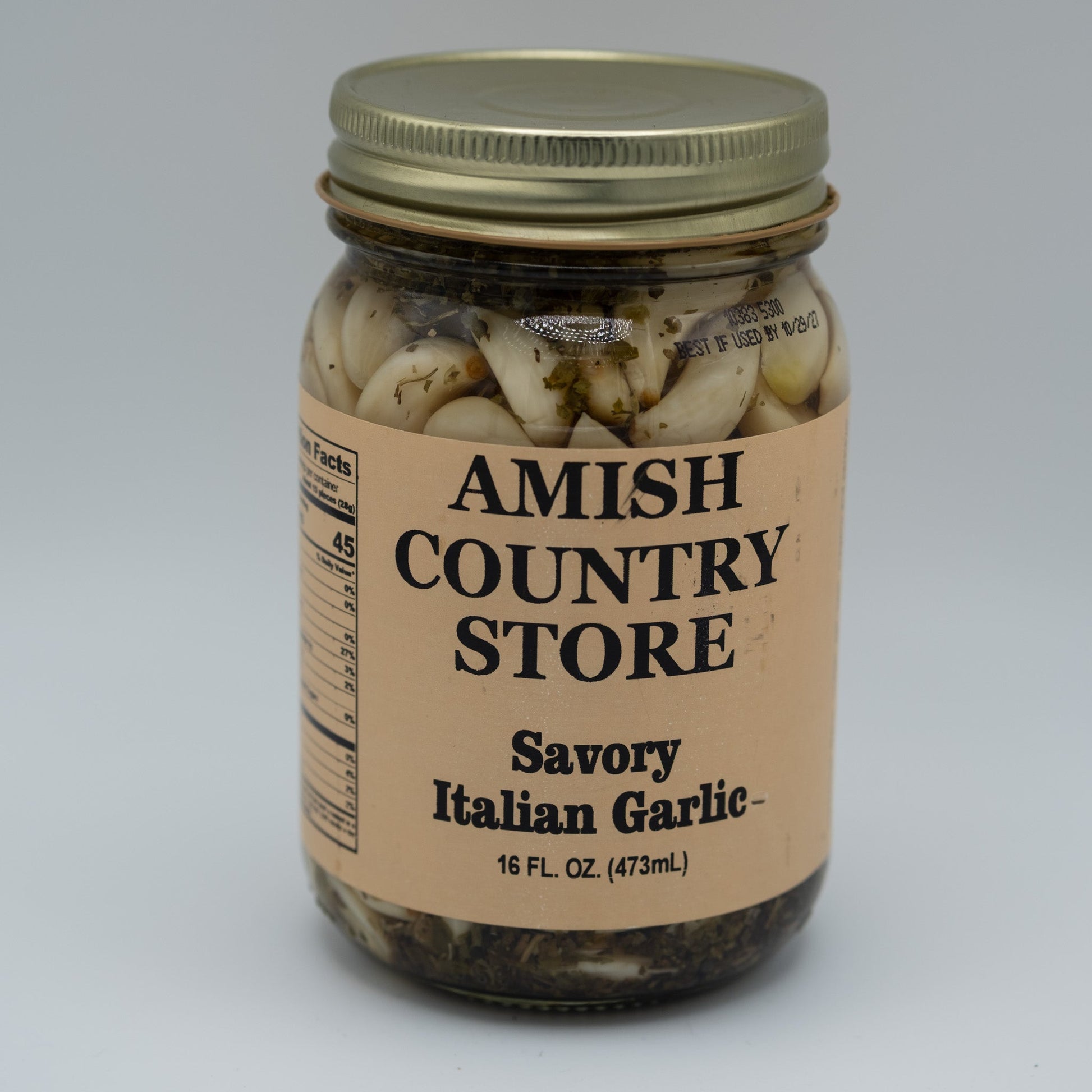 Canned Amish Country Store Savory Italian Garlic in a 16oz jar, showing the label with garlic cloves and Italian seasoning.