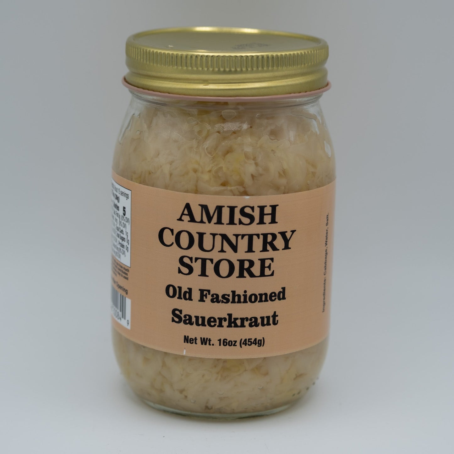 Canned Old Fashioned Sauerkraut in 32oz jar by Amish Country Store, showing fresh, fermented cabbage inside a glass jar.