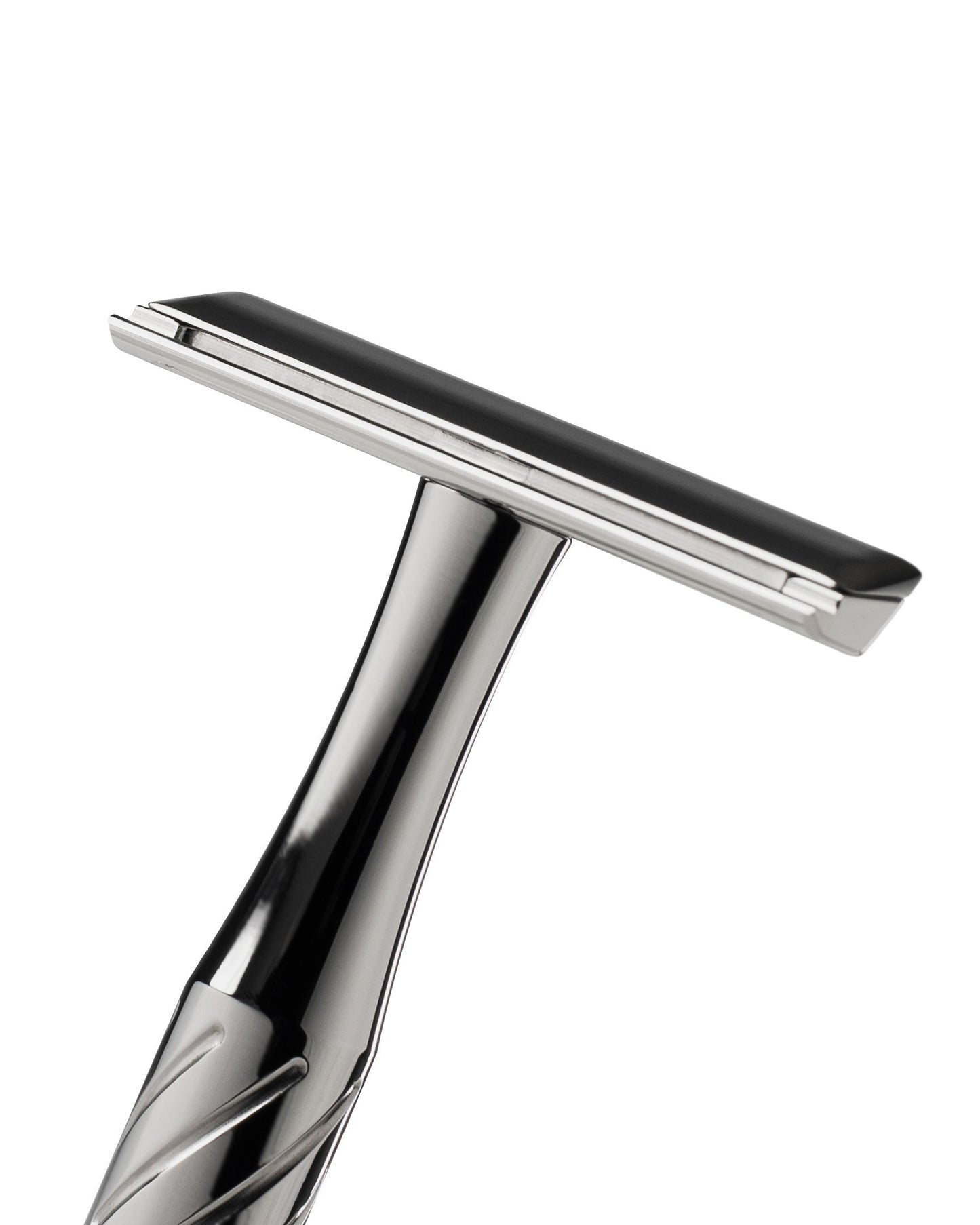Blackland Razors Vector Titanium razor with sleek stainless steel handle and precision blade in a close-up shot.
