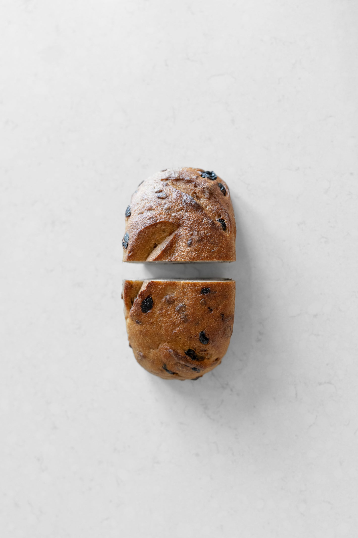 Heaven Gluten Free Bakery cranberry and pecan vegan sourdough loaf with visible cranberries and pecans on crust.