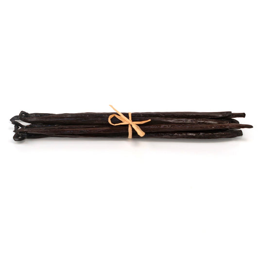 Hawaiian Grade A vanilla beans from Vanilla Bean Kings, fresh and aromatic vanilla beans in a natural close-up shot.