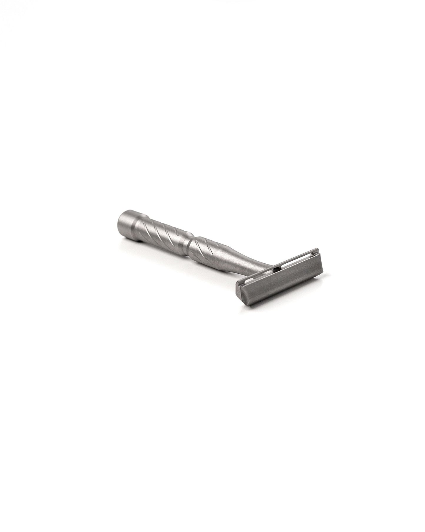 Blackland Razors Vector Titanium safety razor with a sleek, metallic finish and textured handle for a secure grip.