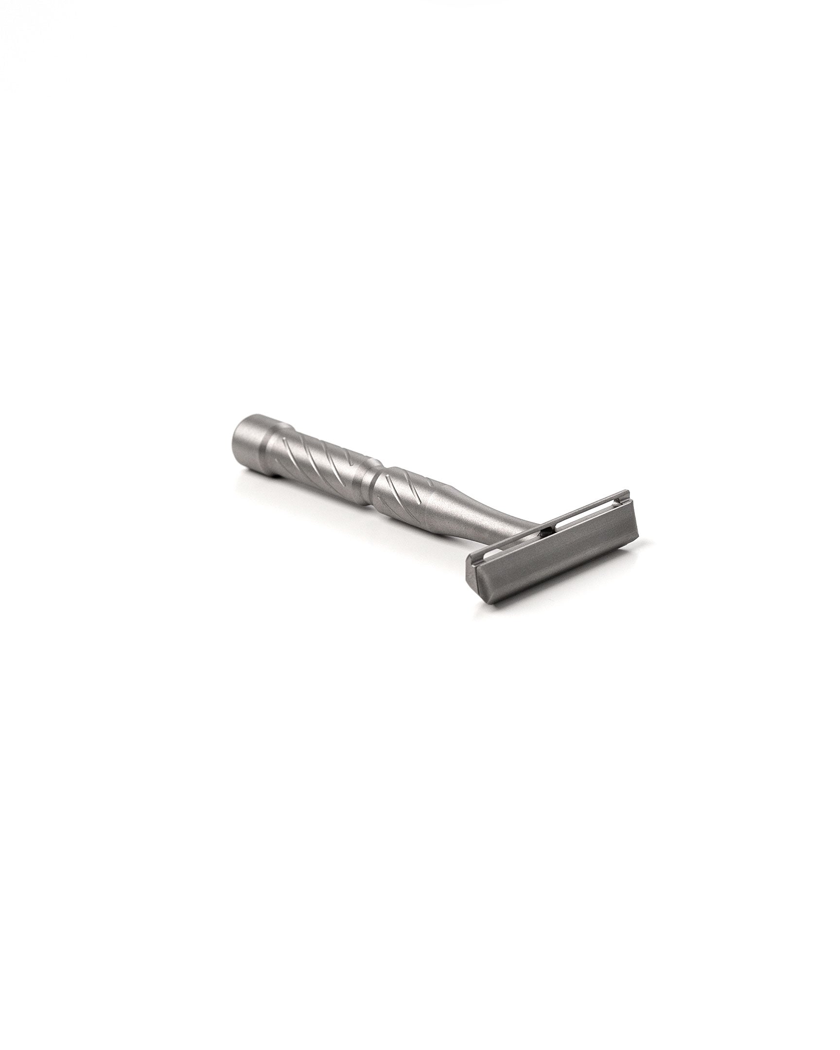 Blackland Razors Vector Titanium safety razor with a sleek, metallic finish and textured handle for a secure grip.