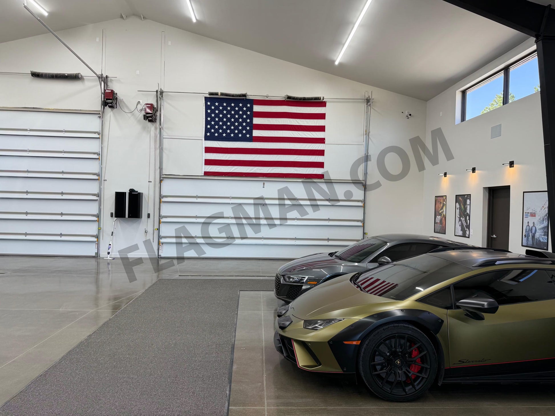 American flag wall-mounted WallSafe™ polyester flag with reinforced grommets, made in USA, displayed hanging on a wall.