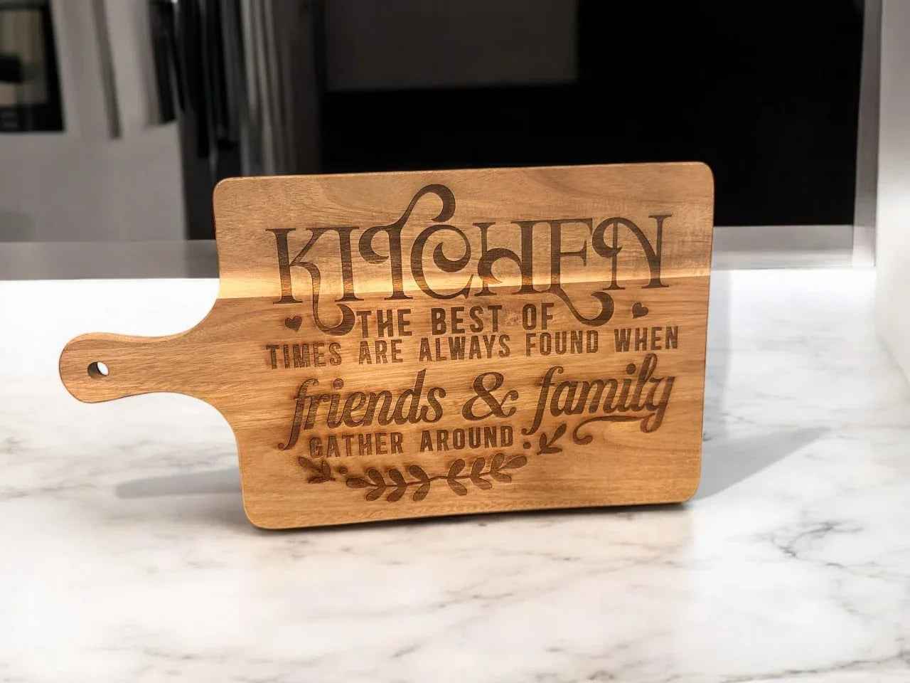 Personalized wooden cutting board by C2 Creations LLC with custom engraved design, ideal for serving and kitchen use.