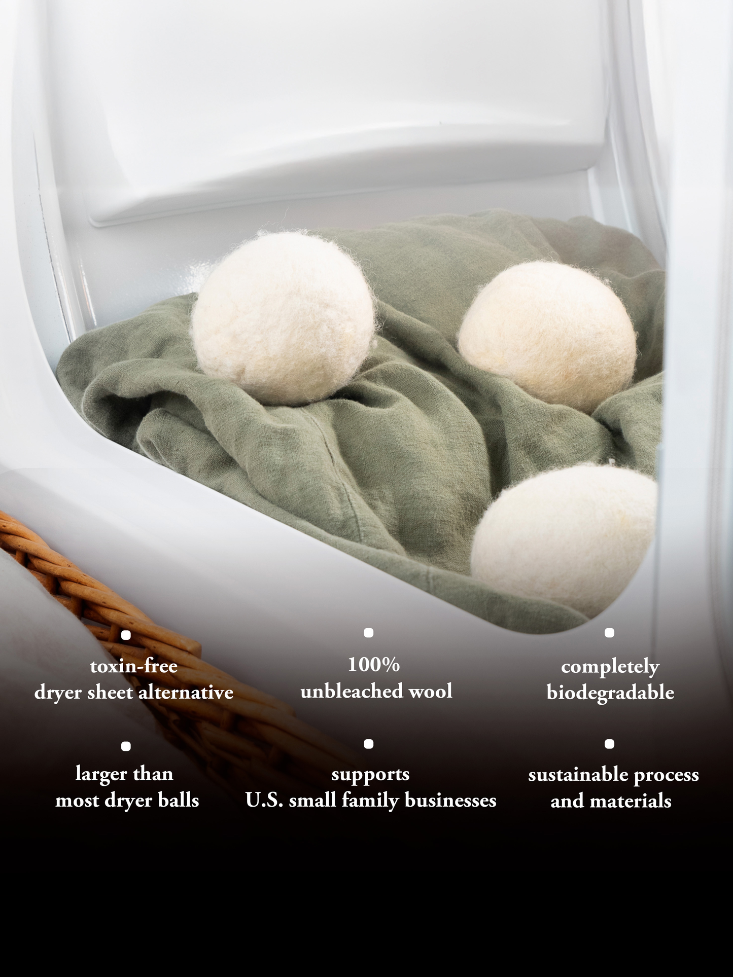 Three Jumbo Wool Dryer Balls by Rustic Strength sit on a green cloth in a dryer. Text highlights their eco-friendly benefits, made from regenerative agriculture and supporting small businesses. (3 pack).