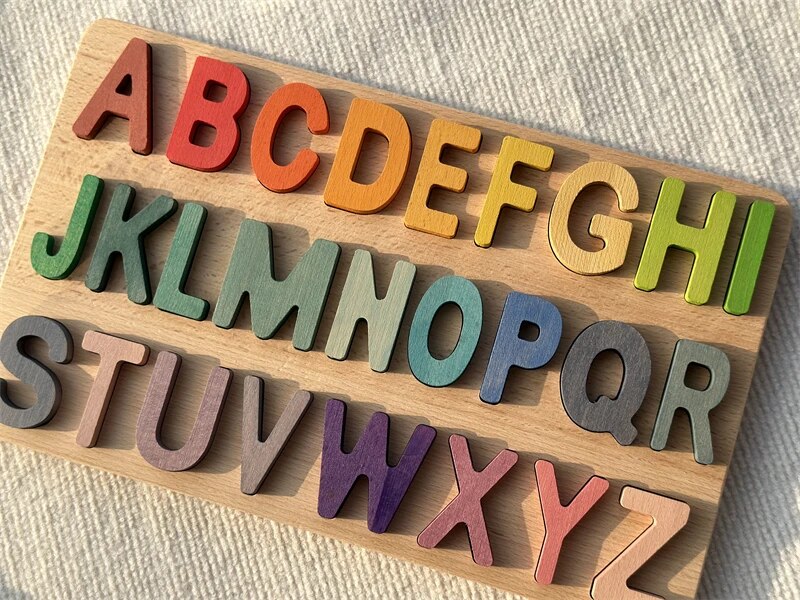 Colorful Montessori wooden ABC puzzles by Petite Pioneers featuring chunky alphabet pieces for early learning and fine motor skills.