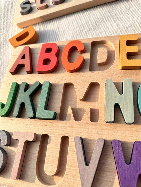 Colorful Montessori wooden puzzles by Petite Pioneers featuring alphabet pieces for early learning and skill development.