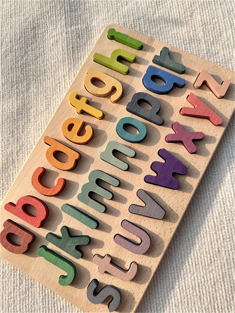Colorful Montessori wooden ABC puzzles by Petite Pioneers featuring alphabet pieces for early learning and skill development.