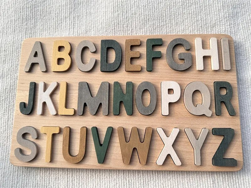 Colorful Montessori wooden puzzles by Petite Pioneers featuring alphabet pieces for early learning and skill development.