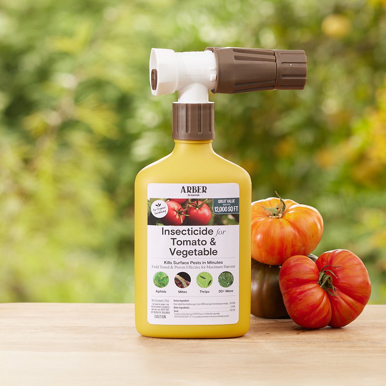 Organic insecticide by Arber designed for tomatoes and vegetables, showing a spray bottle with natural ingredients inside.
