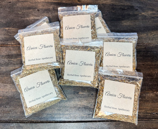 Dried arnica flowers from herbalroseapothecary, showcasing vibrant yellow blossoms for herbal remedies and natural healing.