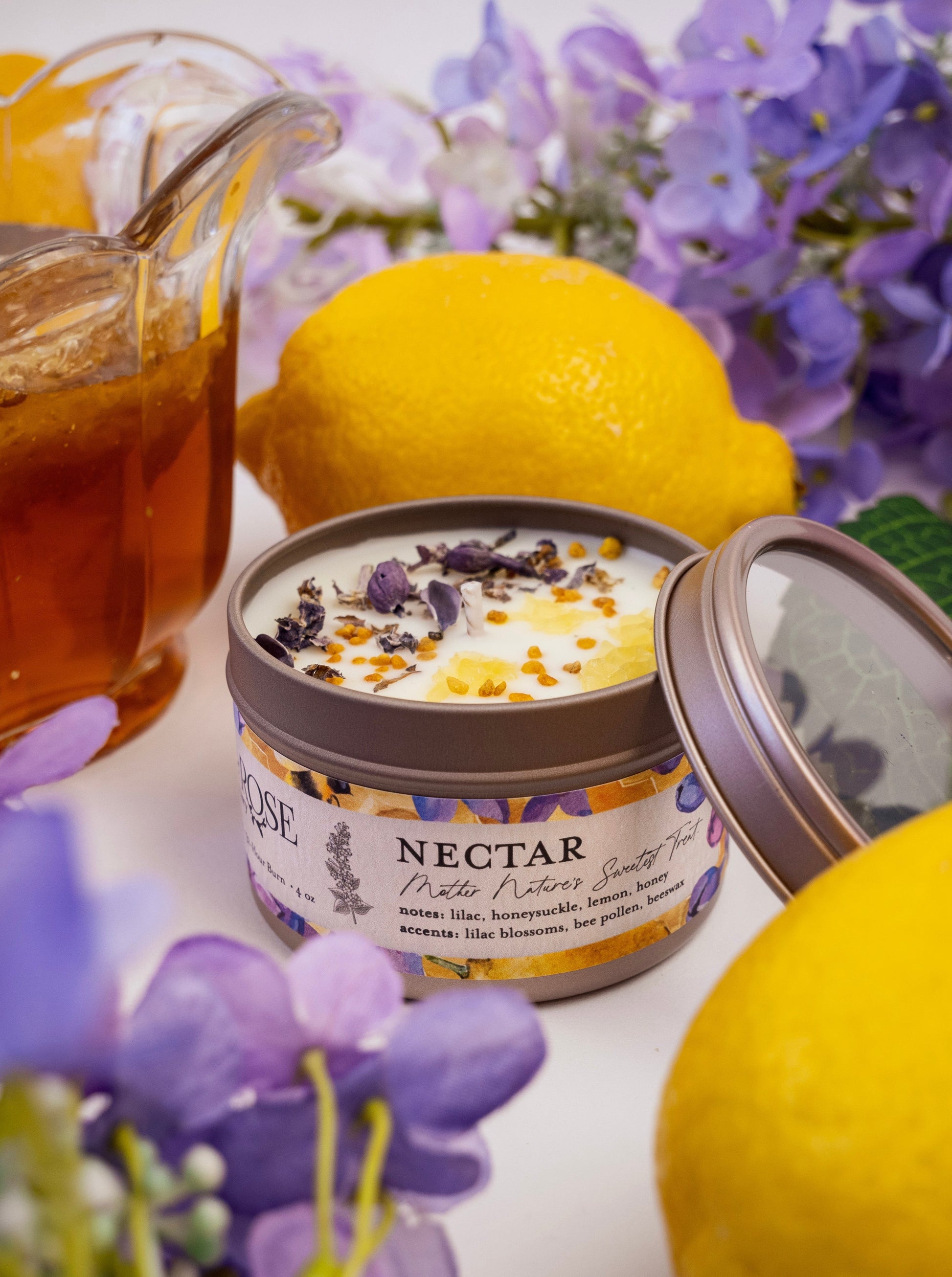Ash & Rose Nectar Lilac Lemon Honey candle in a 4 oz jar, featuring a lilac, lemon, and honey fragrance.