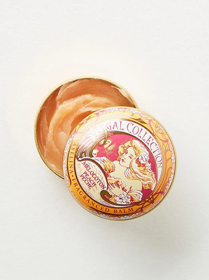 Ash & Rose Perfumeria Gal scented lip balm with orange flavor, featuring a sleek packaging and vibrant orange design.