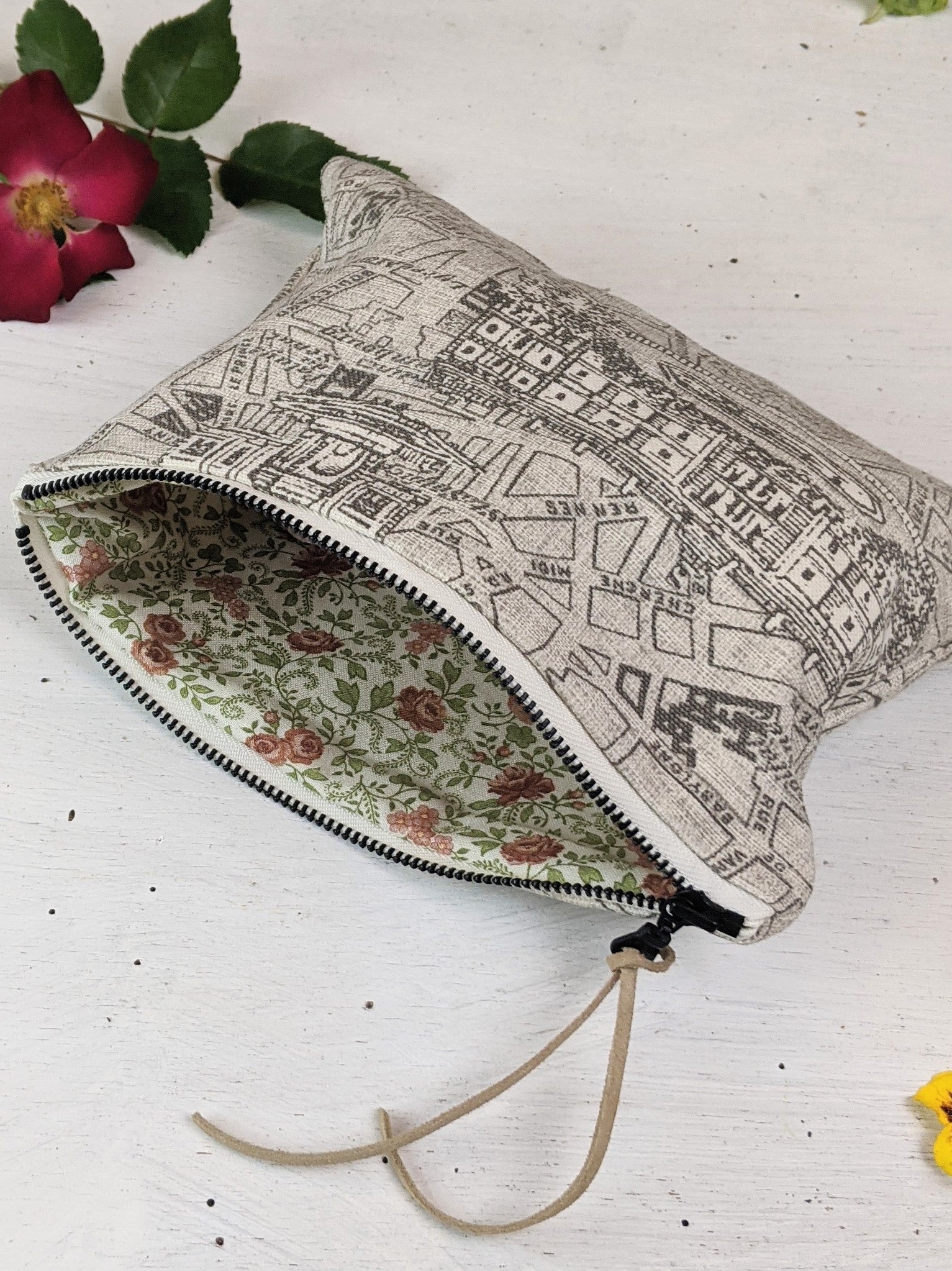 Ash & Rose Paris Map purse featuring a stylish design with a detailed Paris city map print on a compact purse.