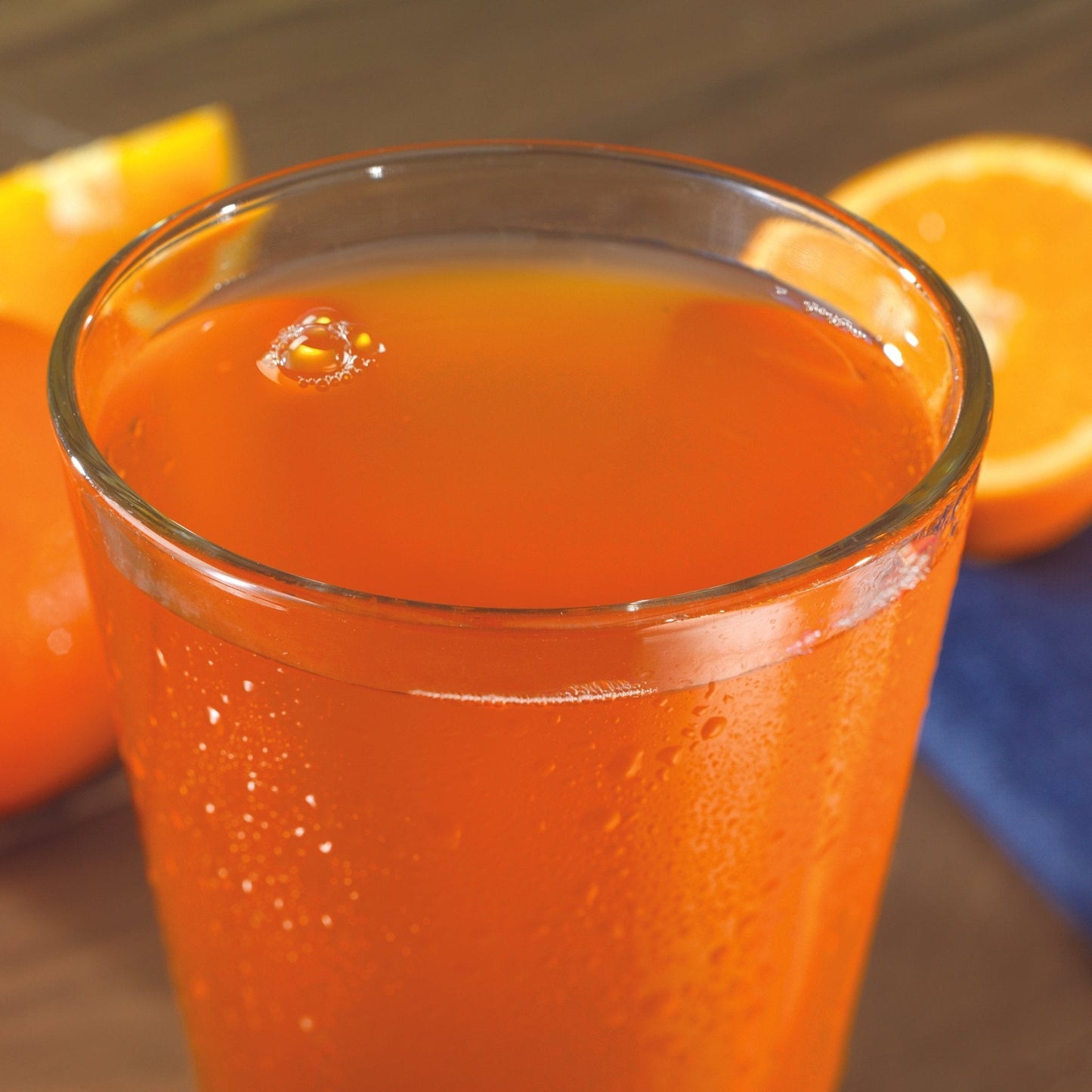 Augason Farms Orange Delight drink mix can, 52 servings, canned food product with bright orange packaging and label details.