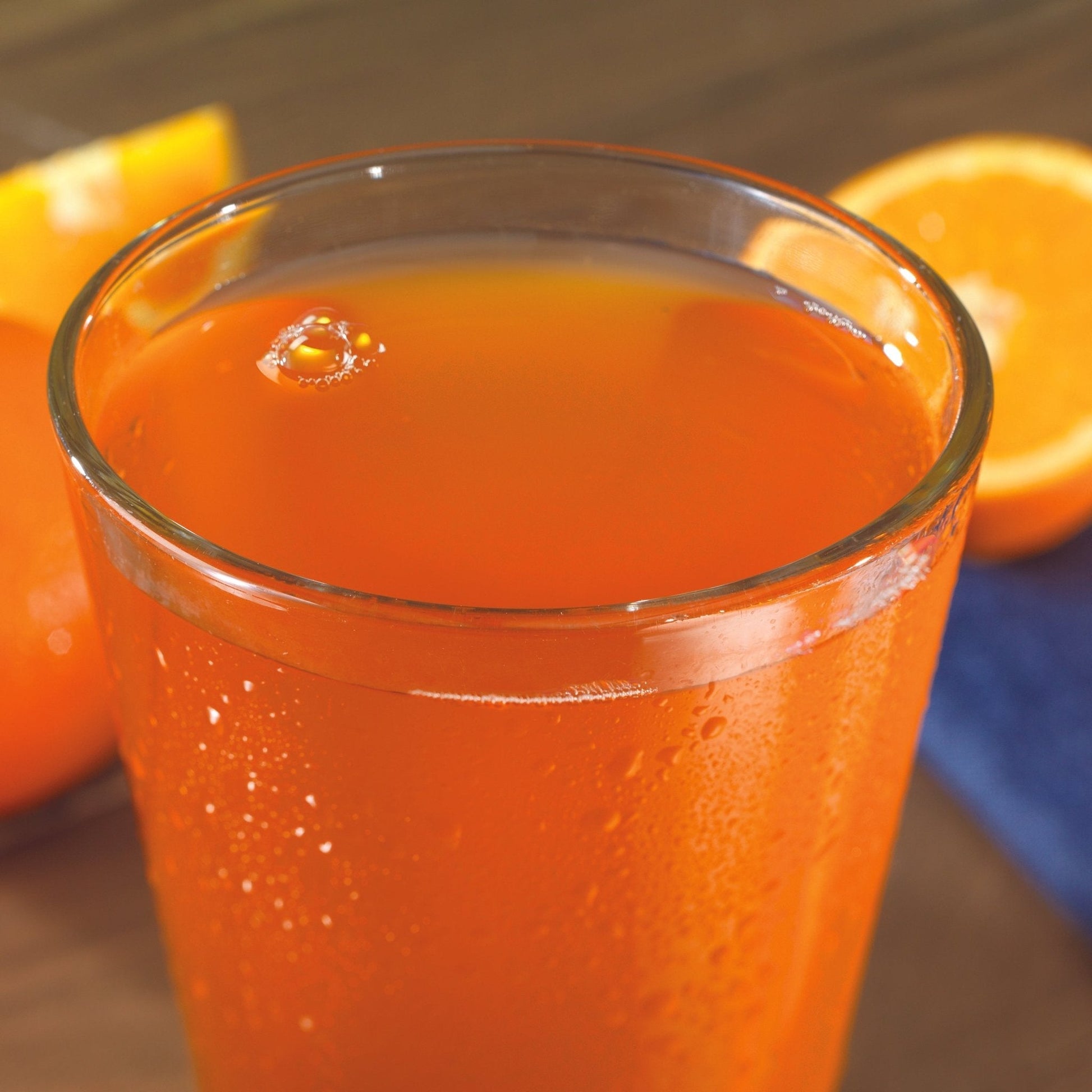 Augason Farms Orange Delight drink mix can, 52 servings, canned food product with bright orange packaging and label details.
