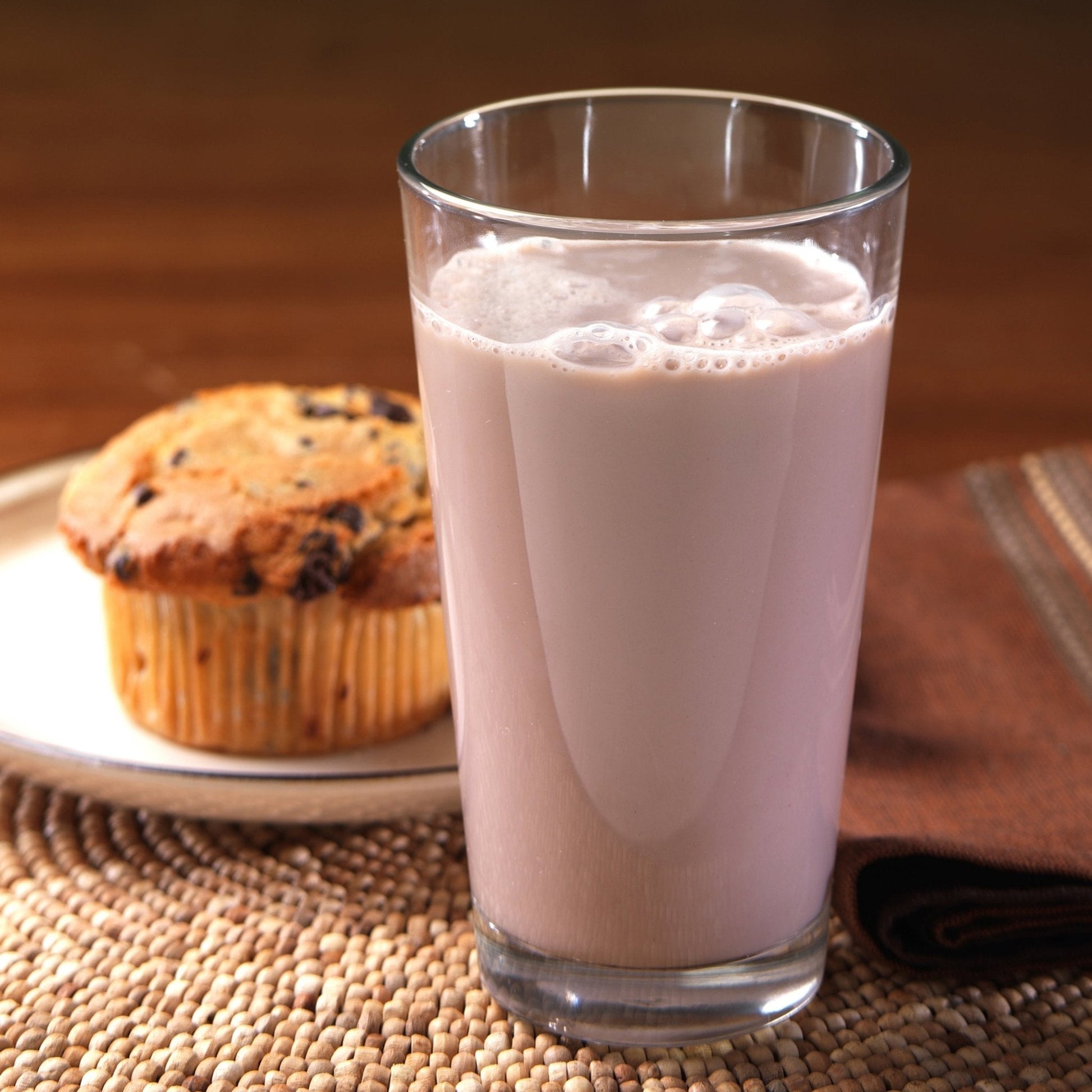 Augason Farms Chocolate Morning Moo's milk alternative can, 67 servings, featuring a brown can with product branding and serving suggestions.
