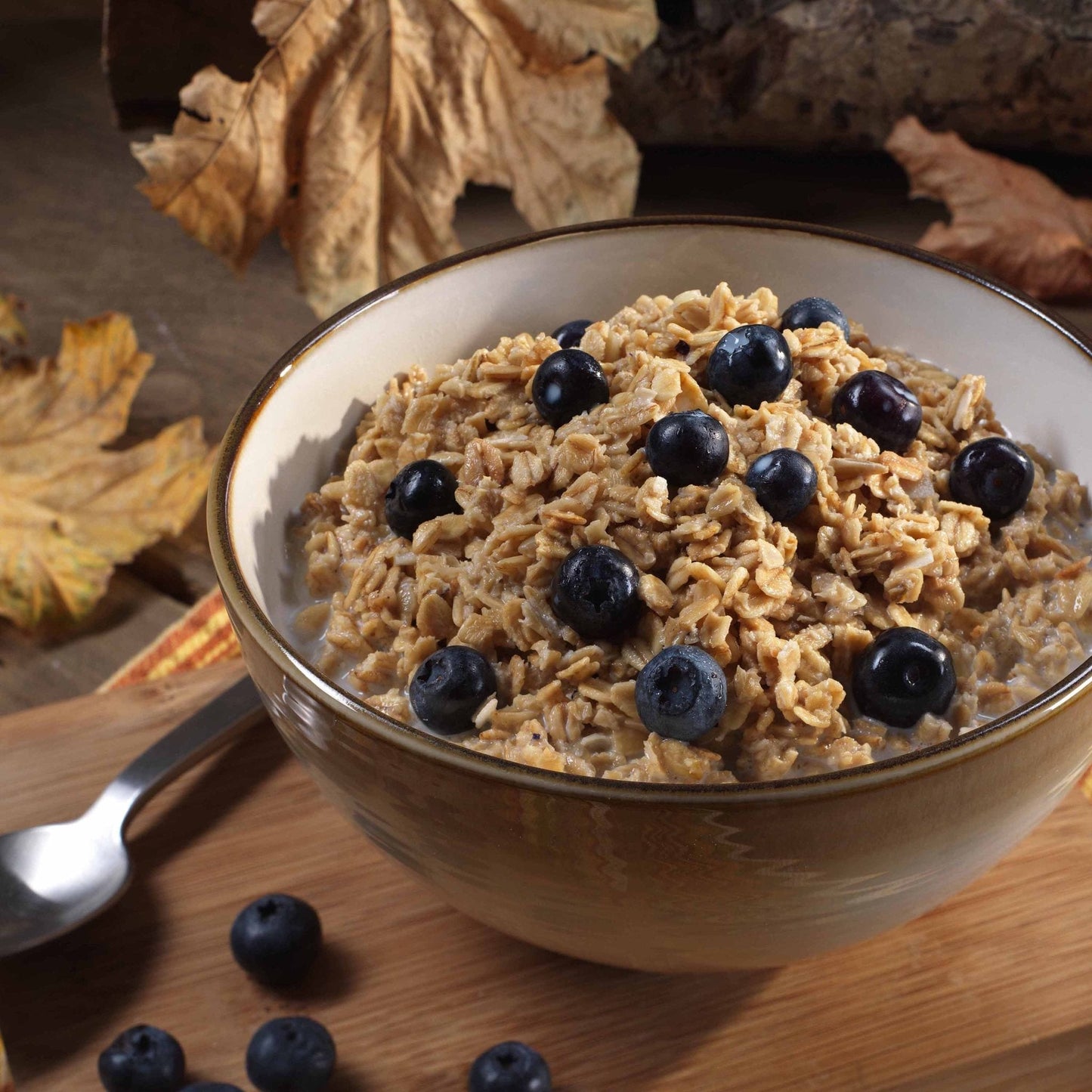 Can of Augason Farms freeze-dried whole blueberries, 26 servings, showing bright dried blueberries inside the can.