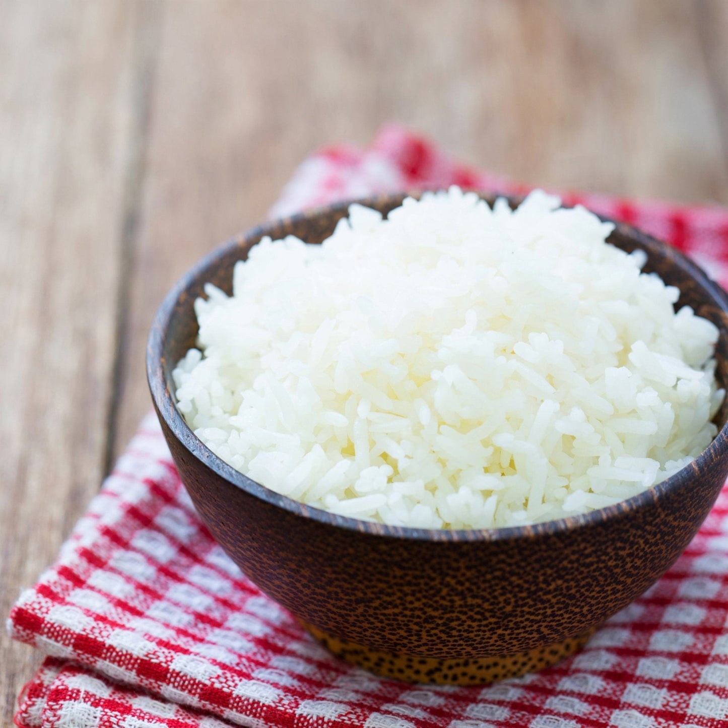 Long grain white rice from Augason Farms in a large container, suitable for 242 servings, ideal for long-term food storage.