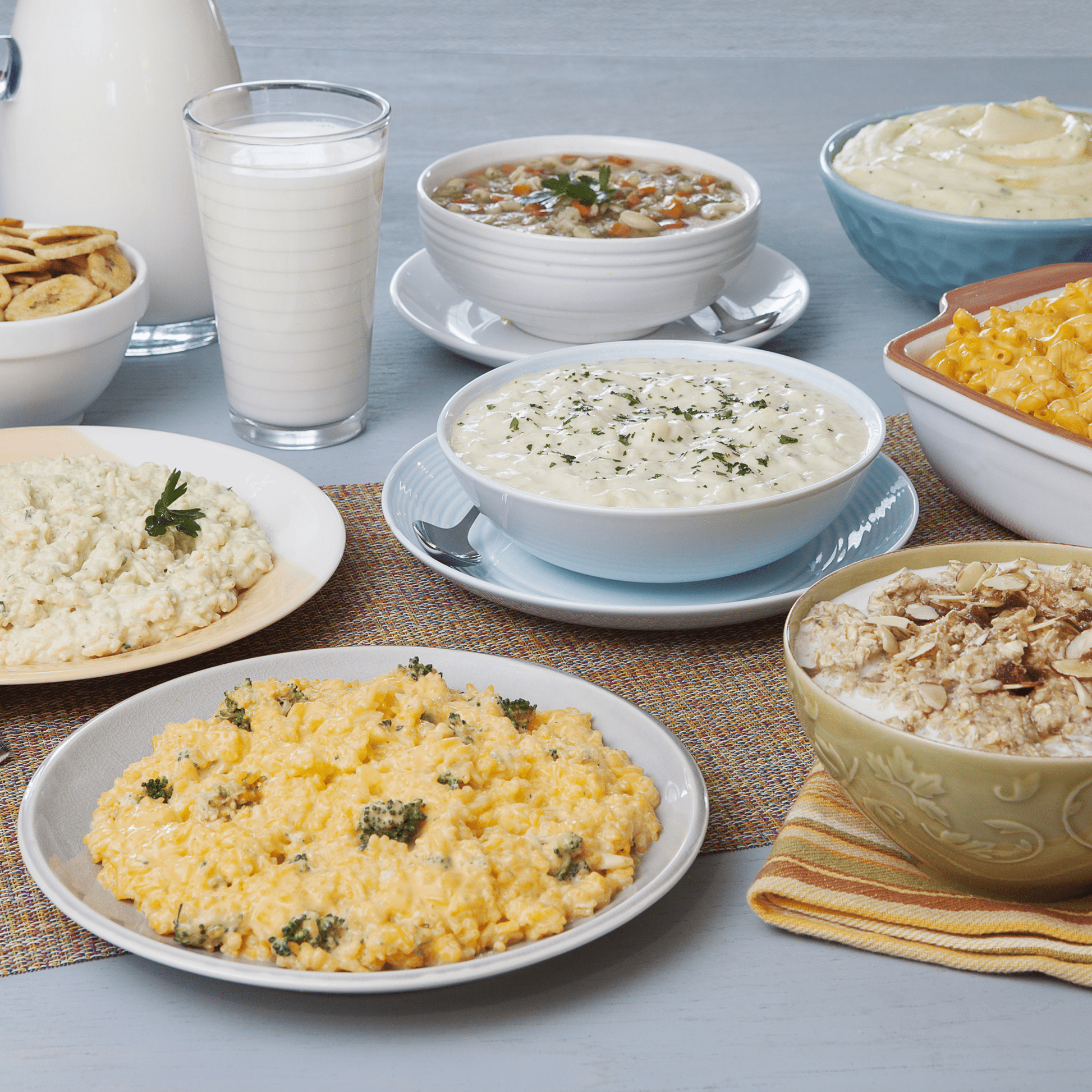 Augason Farms 2-week emergency food supply kit for one person with 119 servings, including assorted dehydrated meals and snacks.
