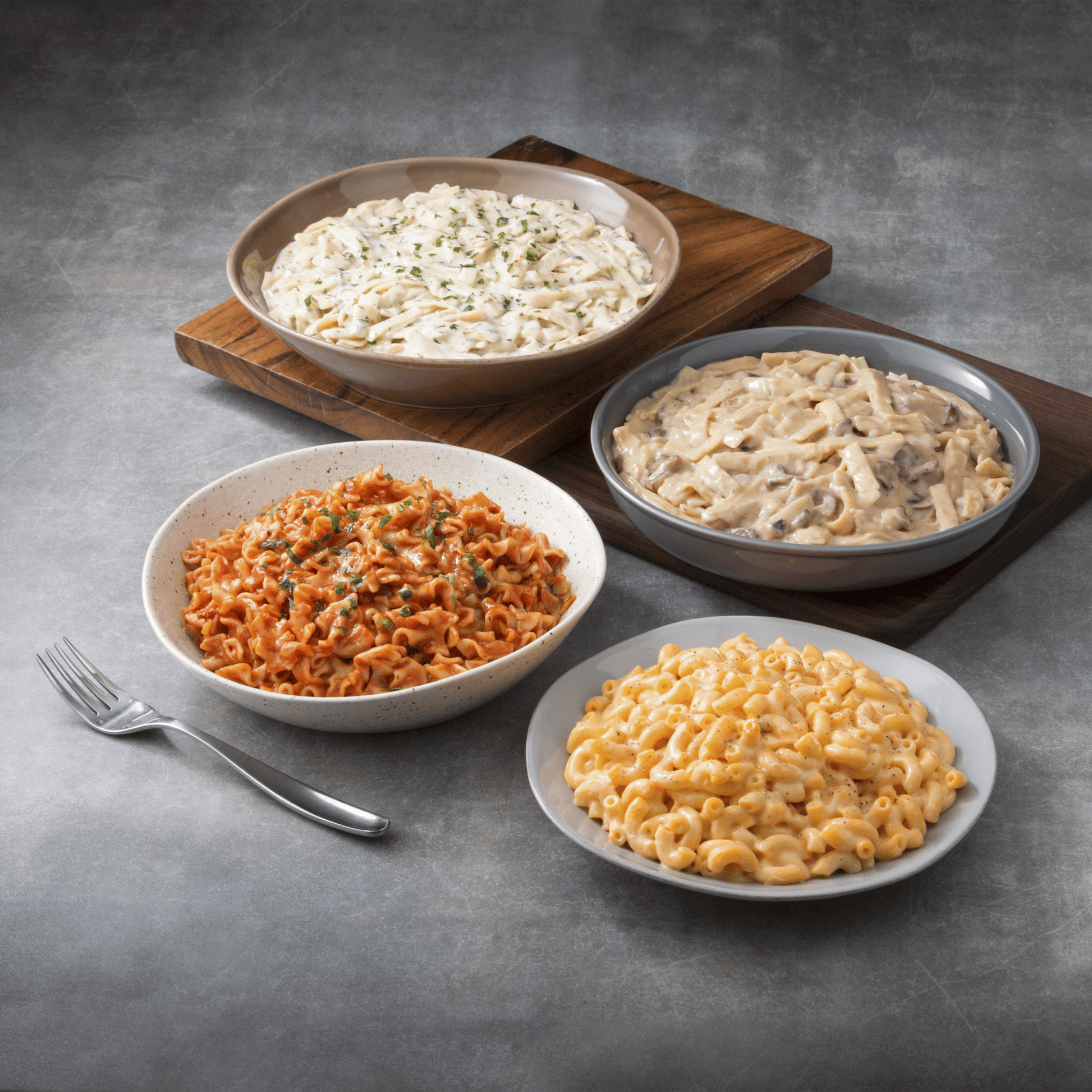 Augason Farms 2-week emergency food supply kit for one person, featuring 119 servings of dried and packaged food for survival.