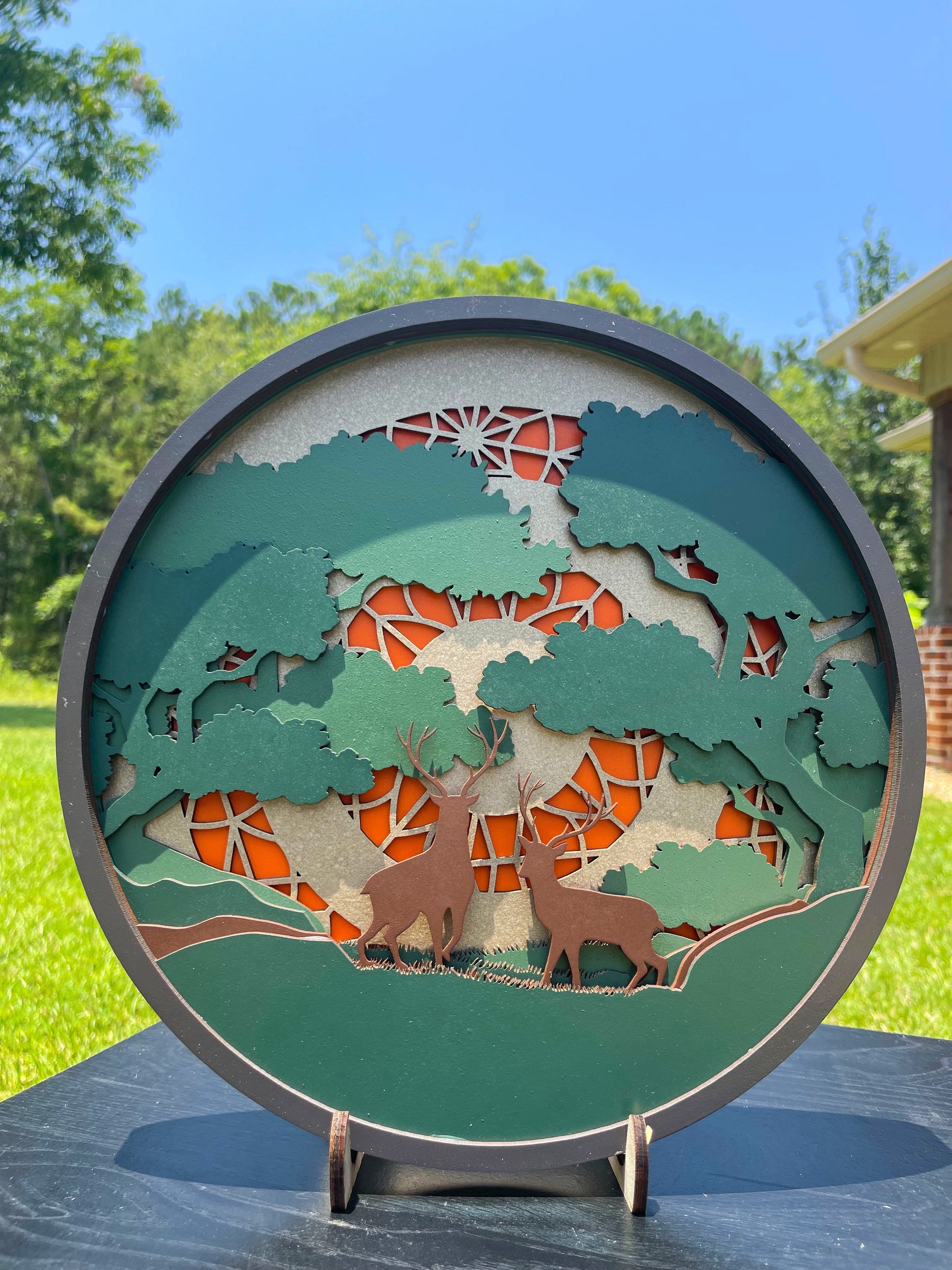 Laser-engraved deer scenic mandala on wood by AVEL Woodworking, showcasing detailed natural forest design.