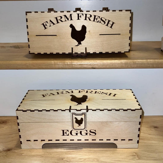 Laser-engraved AVEL Woodworking egg box with a single chicken design, showcasing handcrafted wooden storage for eggs.