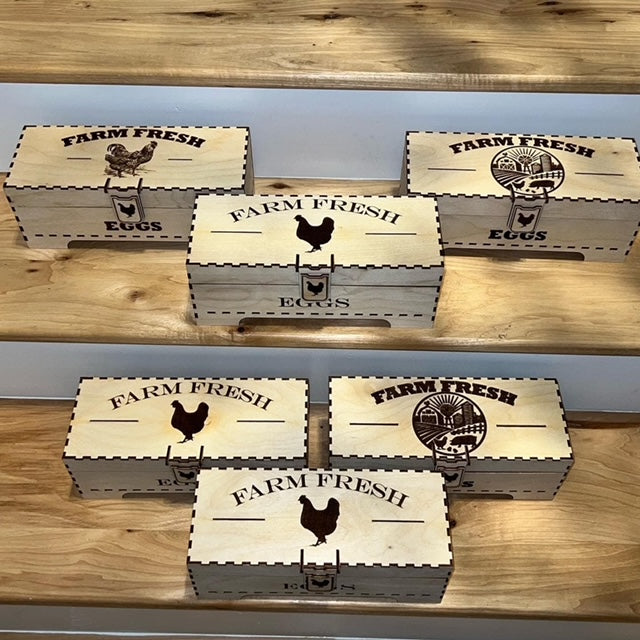 Laser-engraved AVEL Woodworking egg box with a chicken design, made of wood, showcasing detailed craftsmanship.