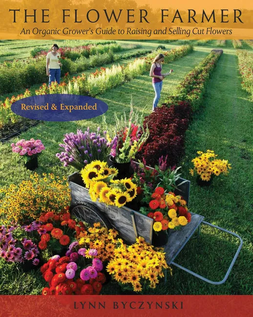 Paperback book titled "The Flower Farmer" by splitShops, showing a colorful cover about organic cut flower growing and selling.
