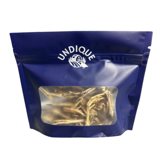 Dog treats in a Quail Feet Training Pack by Quailz.com, featuring natural quail feet treats for dogs.