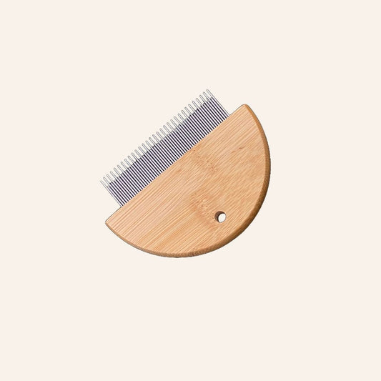 Bamboo flea comb for dogs and cats by Tilley + Me, eco-friendly grooming tool with fine teeth for gentle flea removal.