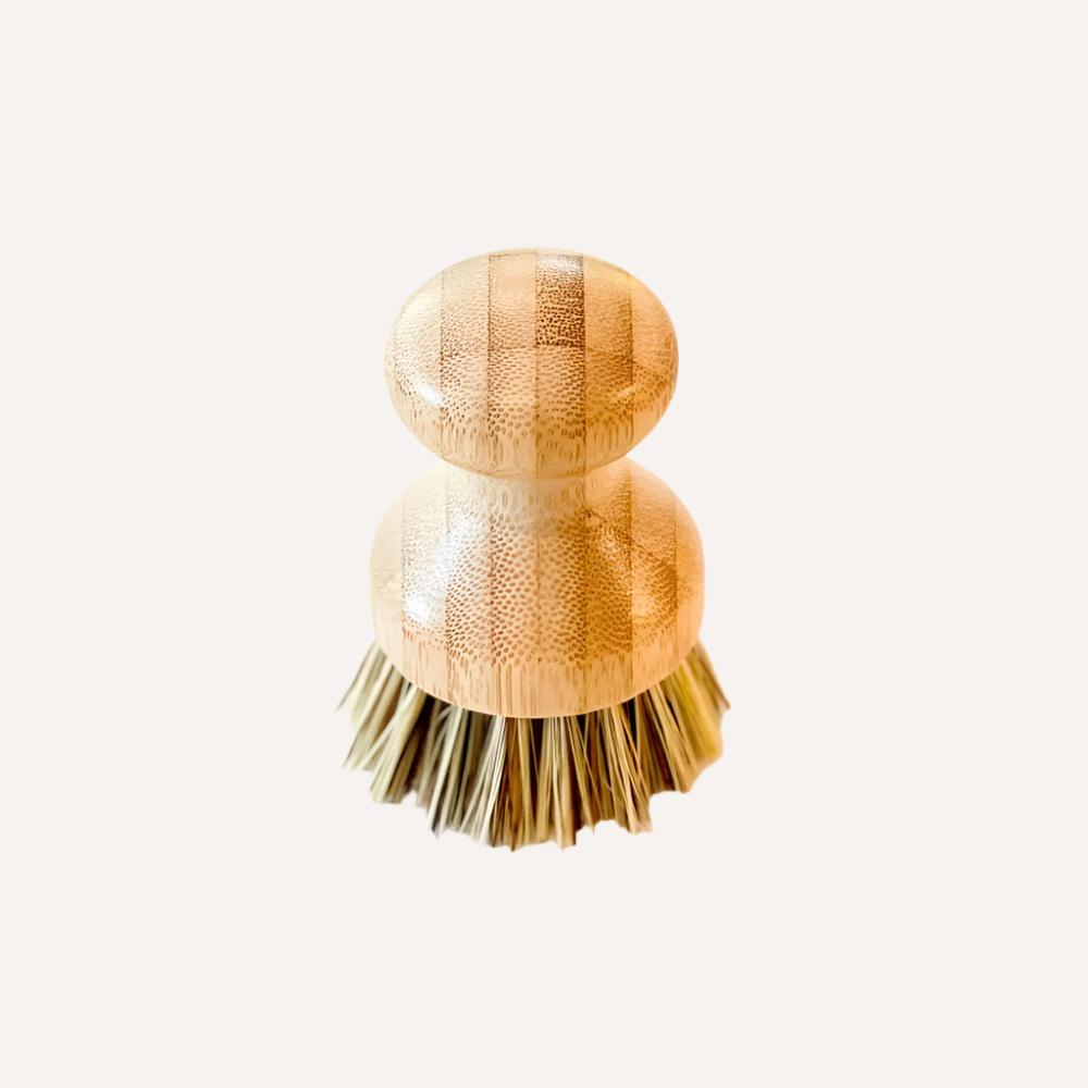 Tilley + Me sustainable bamboo pot scrubber with palm fiber bristles, eco-friendly dishwashing utensil for cleaning pots and pans.