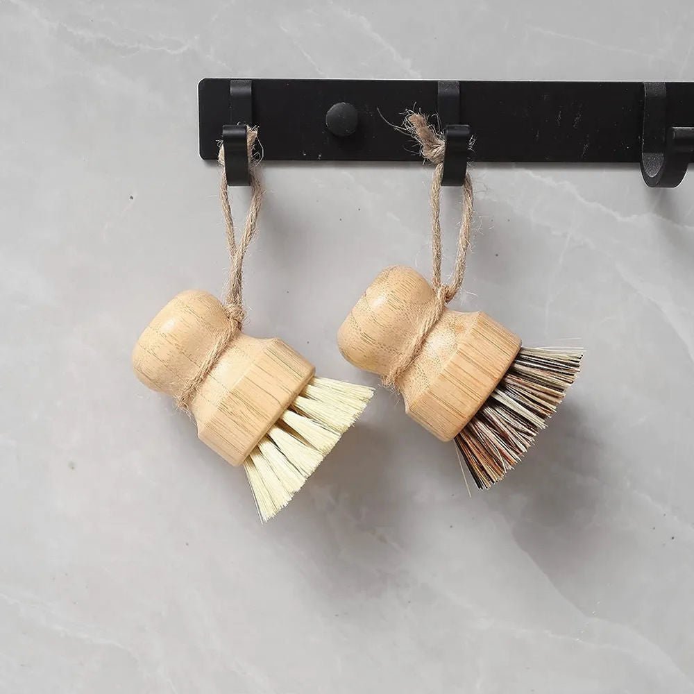 Tilley + Me sustainable bamboo pot scrubber with palm fiber bristles for tough stains and gentle cleaning of cookware.