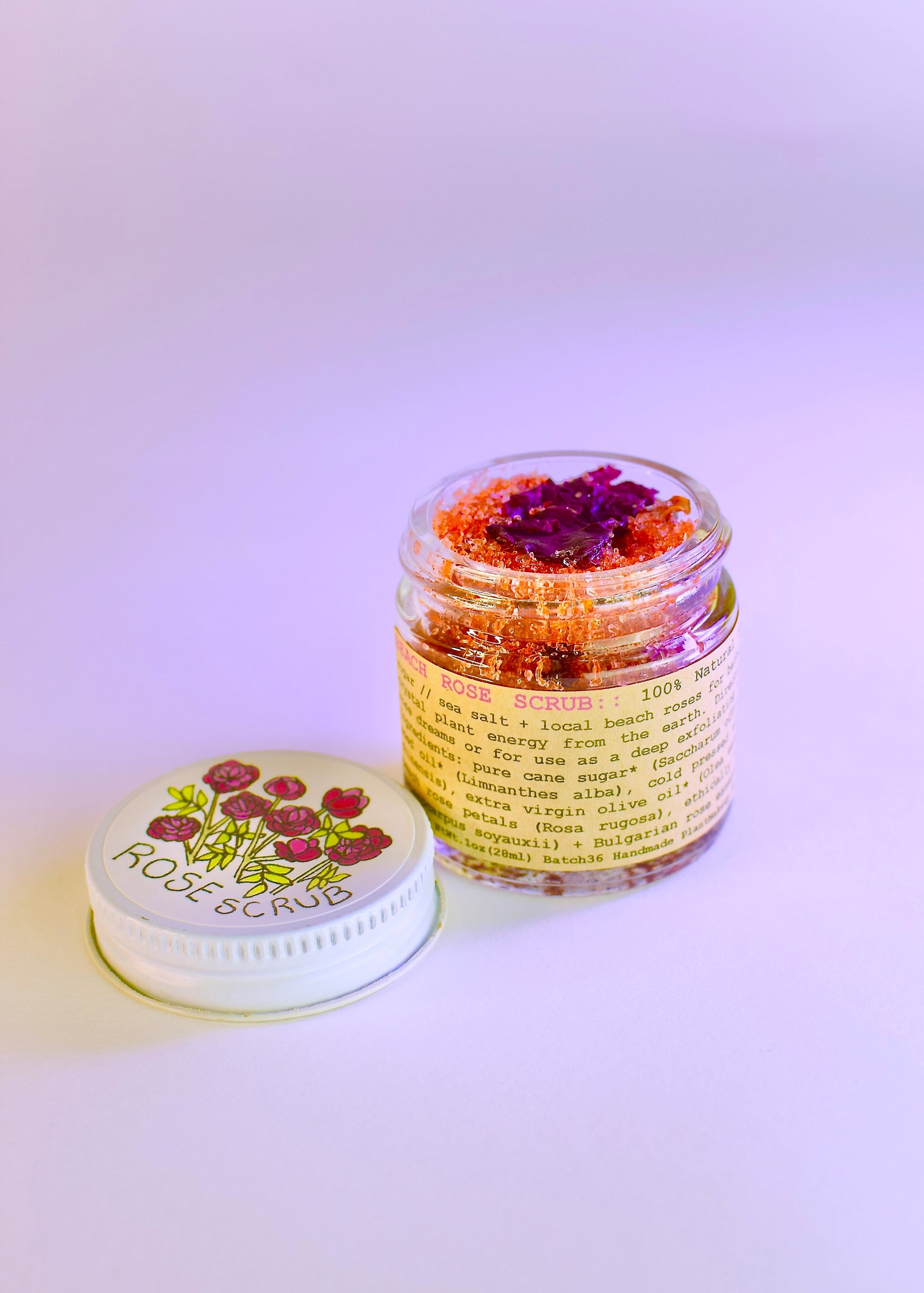 Plant Makeup Beach Rose Scrub in a jar with natural rose exfoliants and botanical ingredients, ready for skincare.