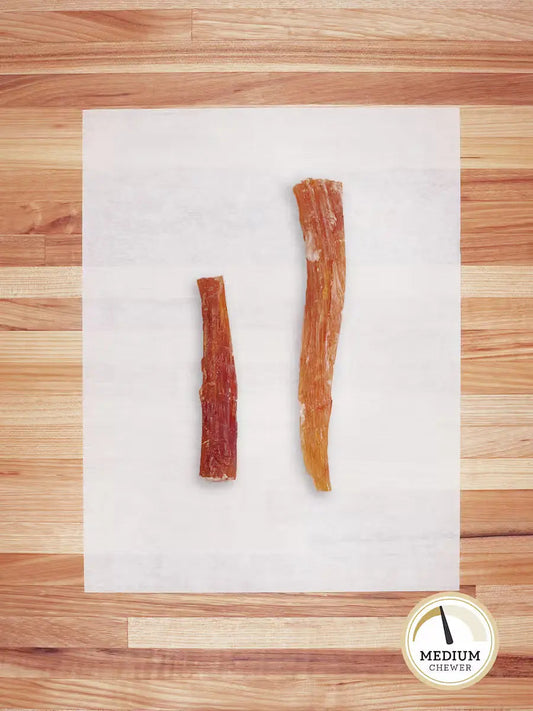 Farm Hounds grass-fed beef tendons chews with beef backstrap, showcasing natural, high-quality dog treats on a clean surface.