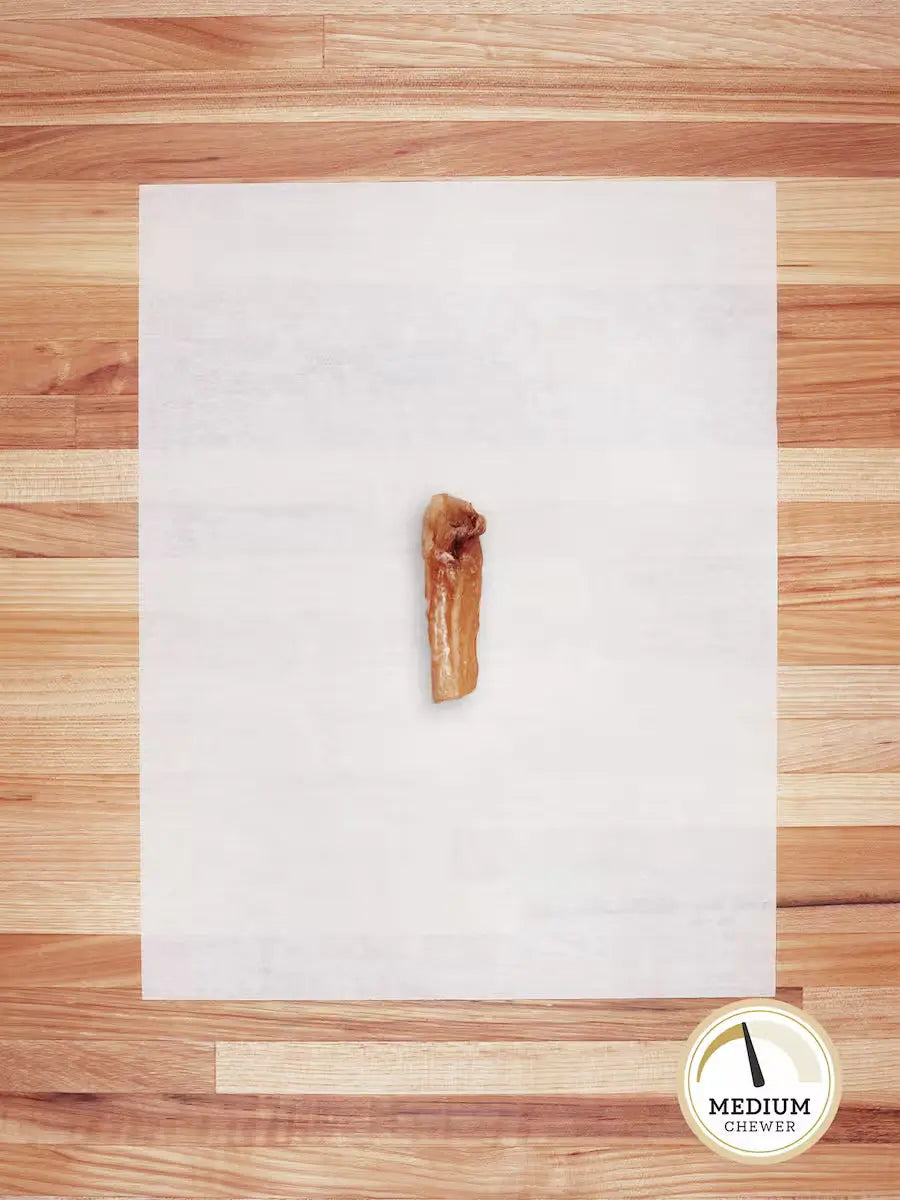 Small beef hocks from Farm Hounds grass-fed beef tendons, natural chews for dogs, showing the textured dried tendons.
