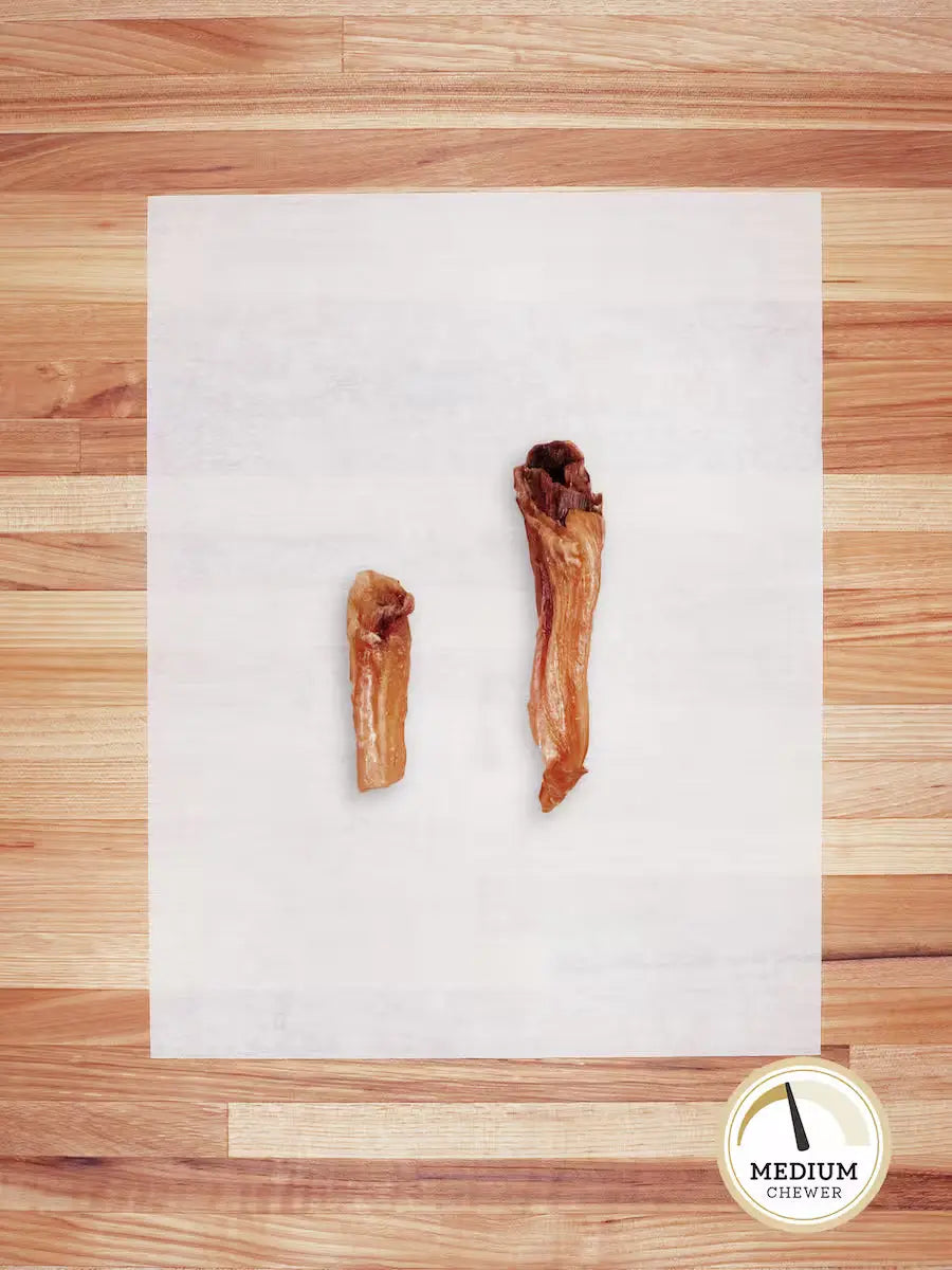 Farm Hounds grass-fed beef tendons chews for dogs, showing a close-up of beef hocks with textured, natural beef tendons.