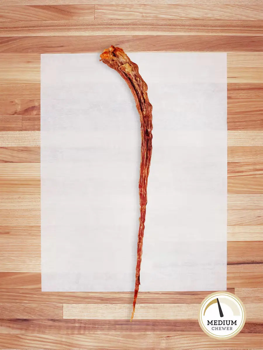 Farm Hounds beef tail chew for dogs, natural and long-lasting dog treat made from high-quality beef tail.