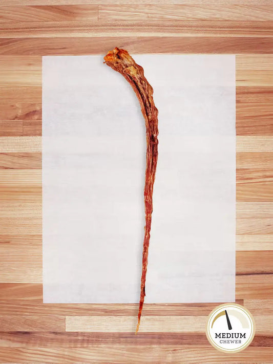 Farm Hounds beef tail chew for dogs, natural and long-lasting dog treat made from high-quality beef tail.
