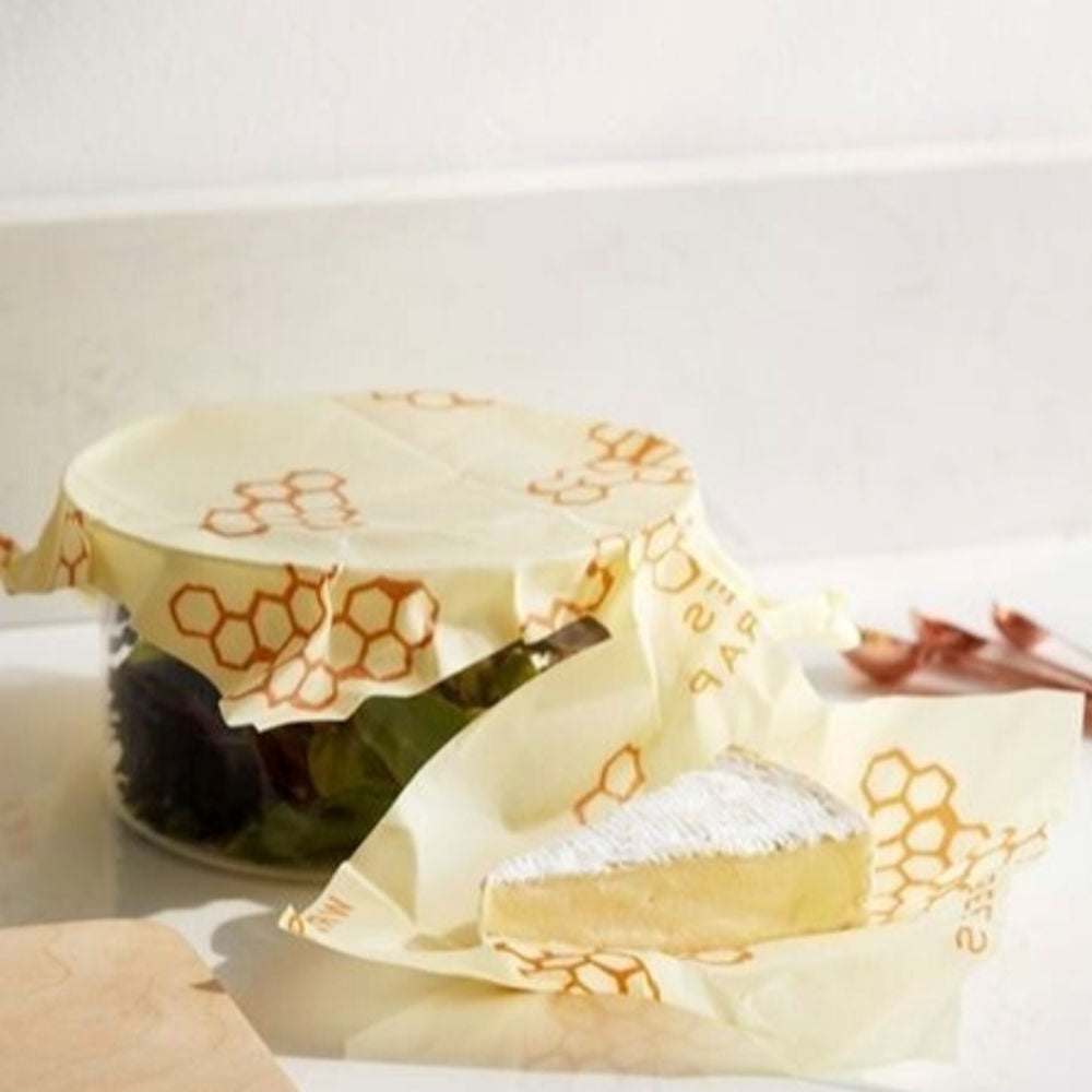 Reusable Tilley + Me beeswax food wraps in various sizes, showcasing organic, eco-friendly food storage solutions.