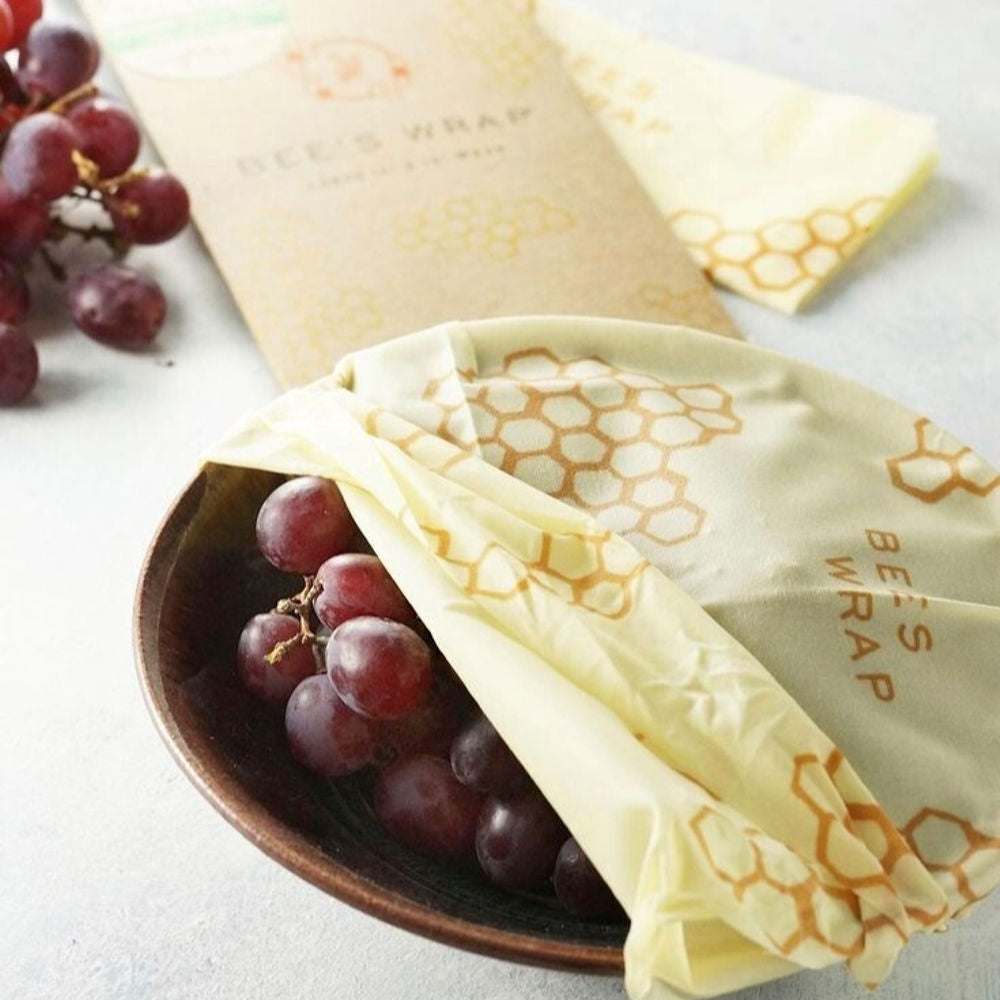 Reusable beeswax food wraps by Tilley + Me, organic, with colorful patterned designs, perfect for sustainable food storage.