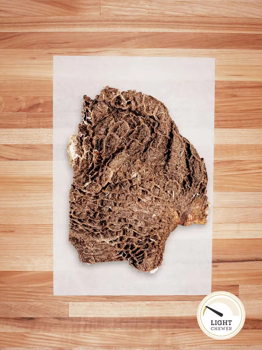 Green Bison Tripe dehydrated chews by Farm Hounds, showing chewy, green-tinted bison tripe treats for dogs.