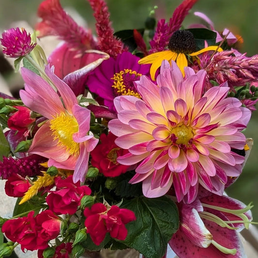Farm-fresh Deluxe flower arrangement in a 32 oz mason jar with 25 stems, featuring colorful fresh cut flowers for special occasions.