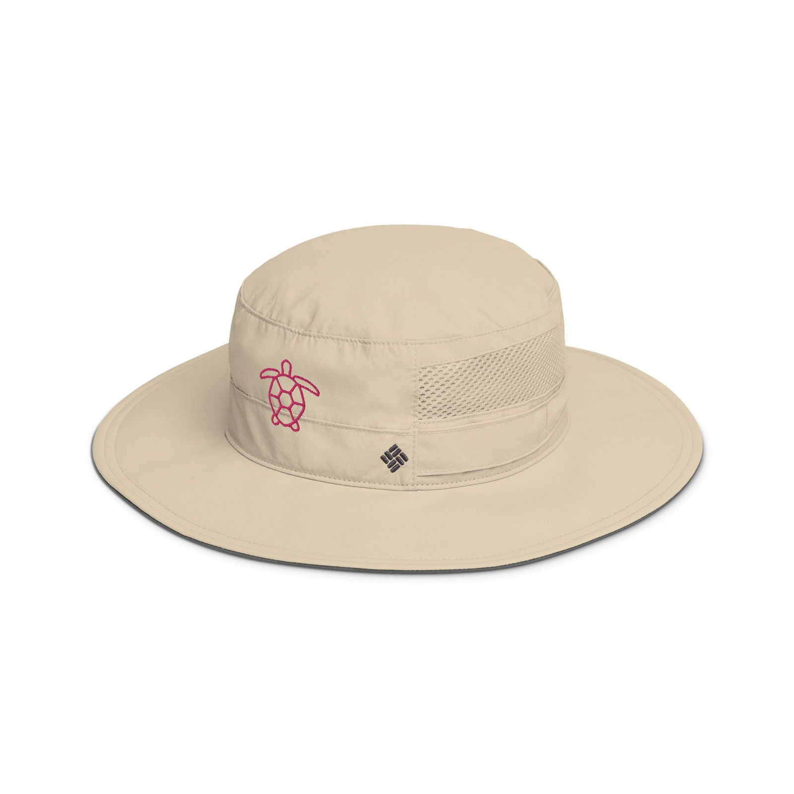 Columbia sun hat featuring a pink sea turtle design on a beige background with a grey brim and breathable mesh paneling

