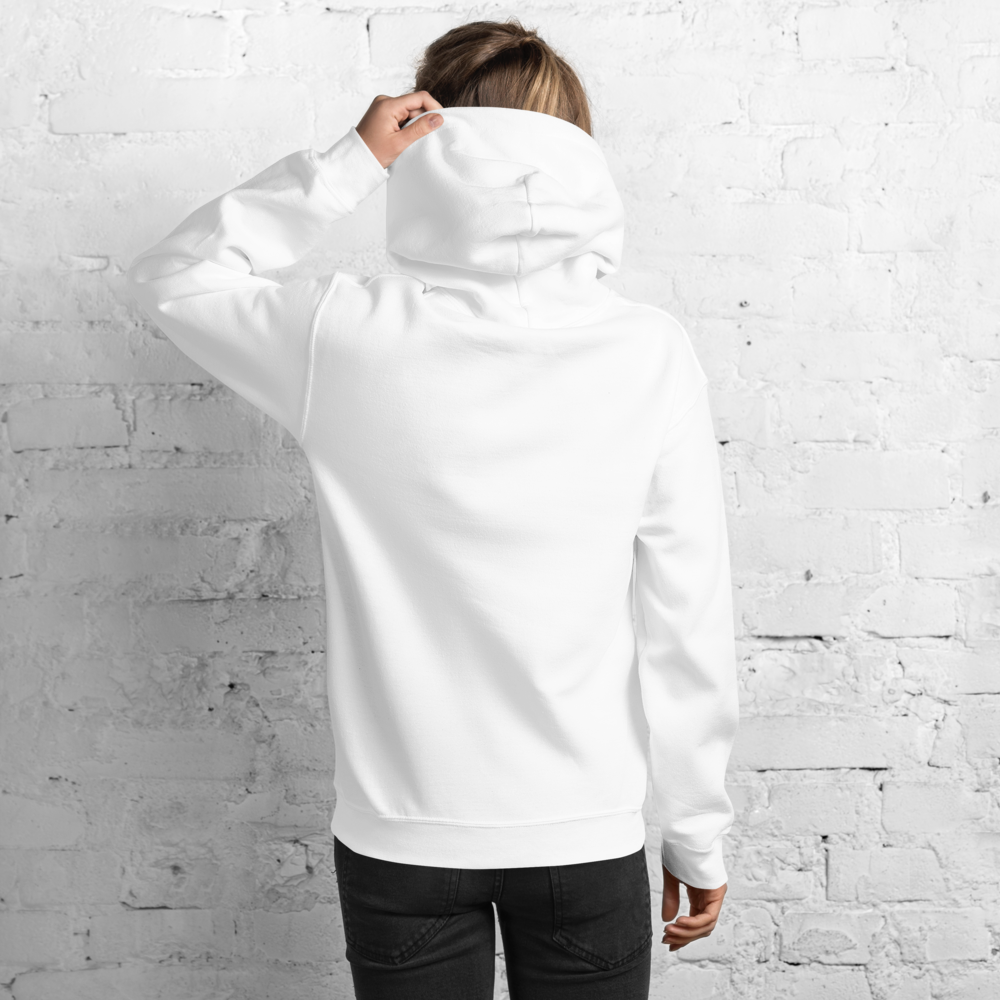 Photography unknown artist a white hoodie model against a white brick wall showcasing the soft fabric and comfortable fit with long sleeves and a drawstring hood