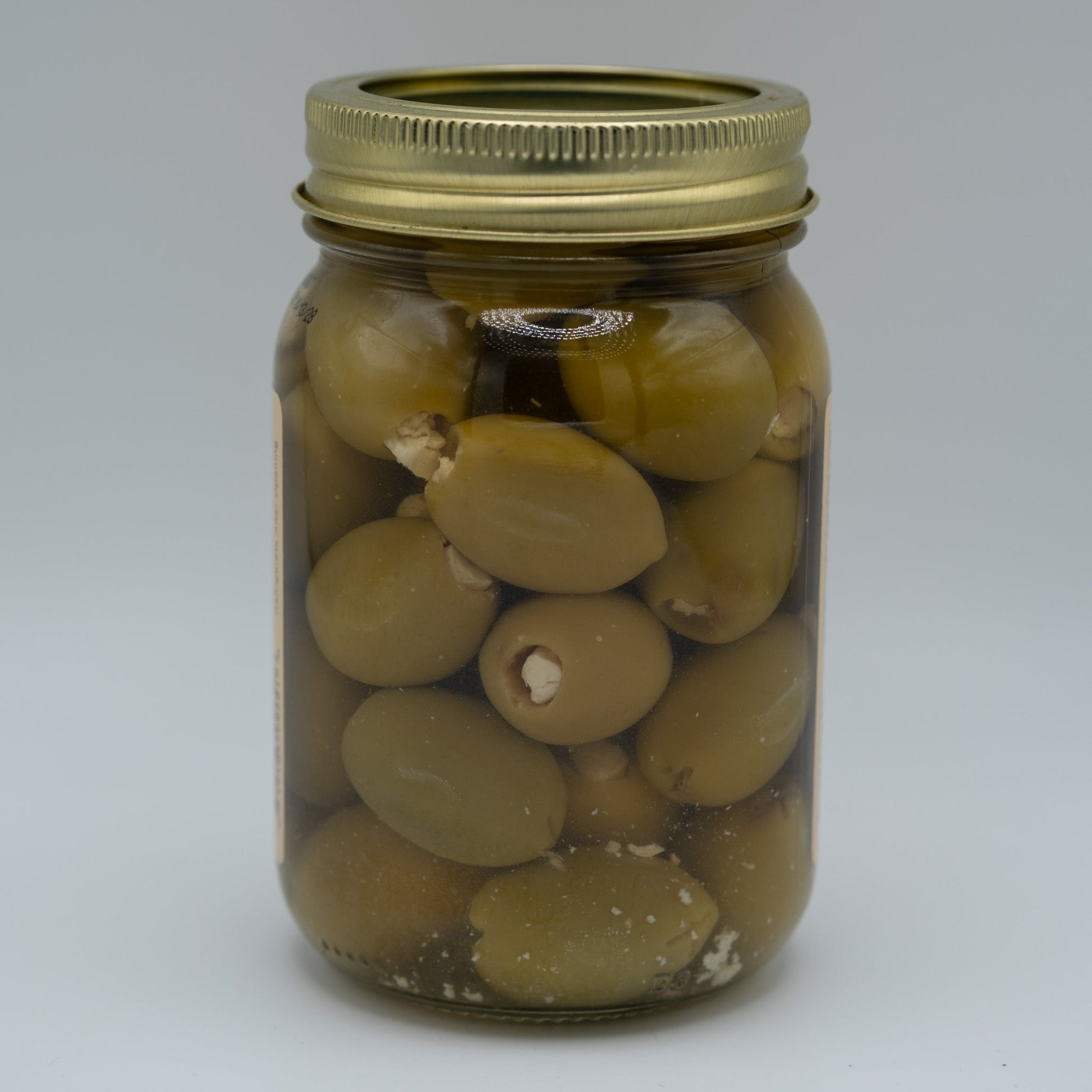 Canned Bleu Cheese Olives by Amish Country Store in a 16oz can, showing green olives stuffed with blue cheese inside the can.