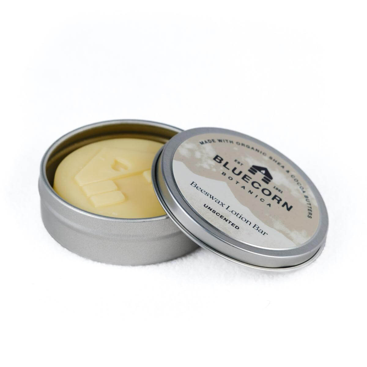 Bluecorn Beeswax Lotion Bars from Bluecorn Candles, apothecary skincare product with natural beeswax in a compact form.